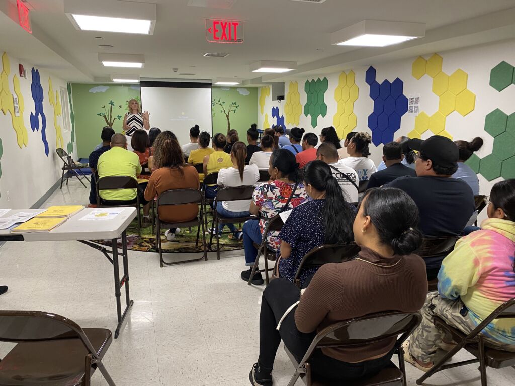 Children's Day parents receiving support through a family workshop.